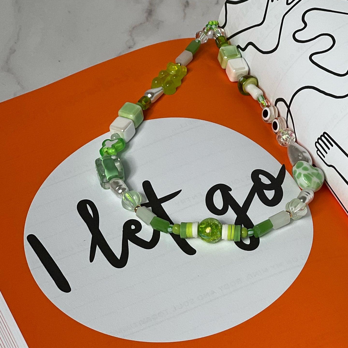 AVOCADO CRÈME BRÛLÉE STRAP WITH BOOKMARK