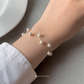 SWAROVSKI CRYSTAL PEARL CROSS BRACELET